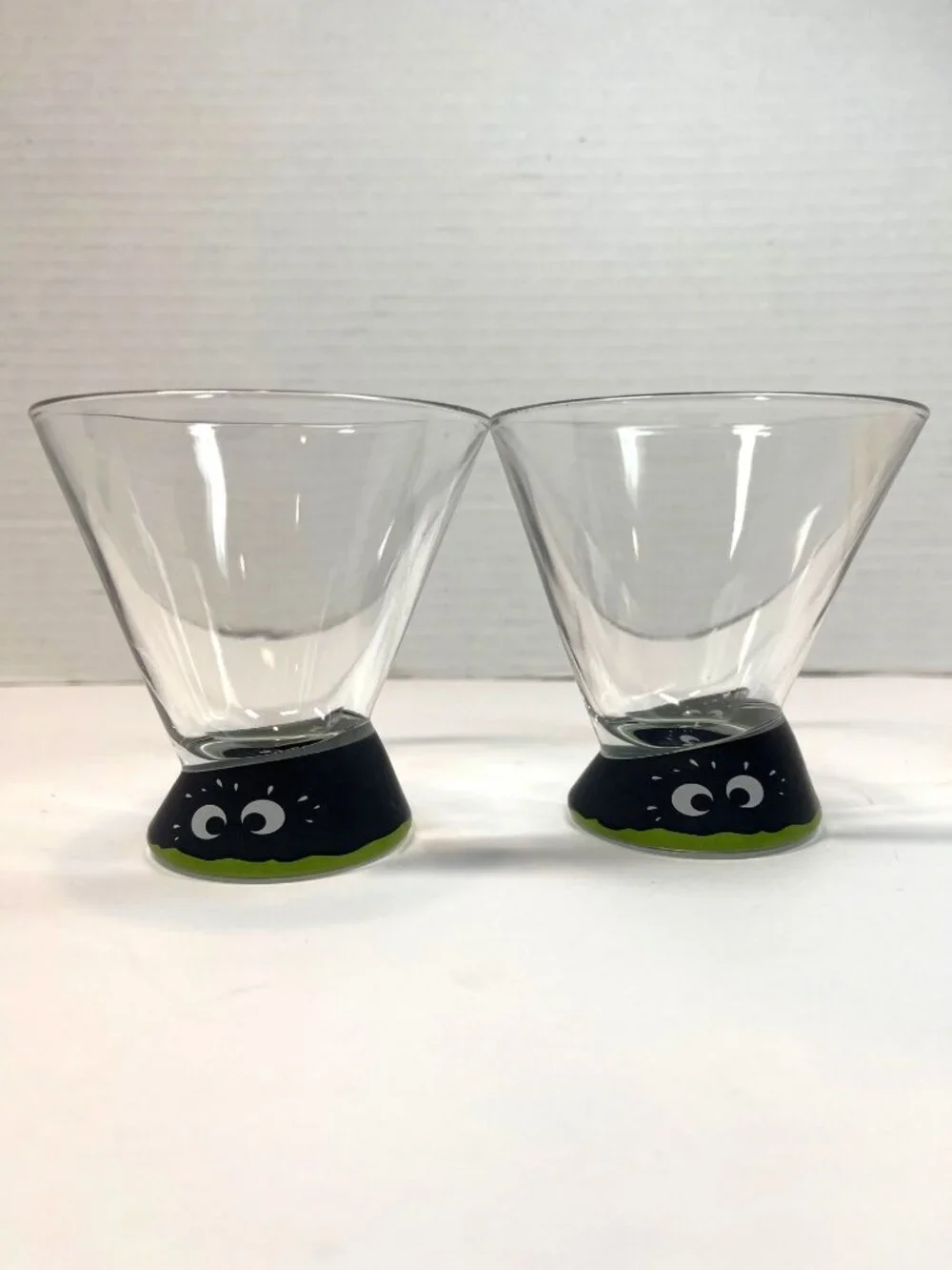 Set Of 2 Clear Glass Monster-Themed Shot Glasses with Black and Green Base Desig